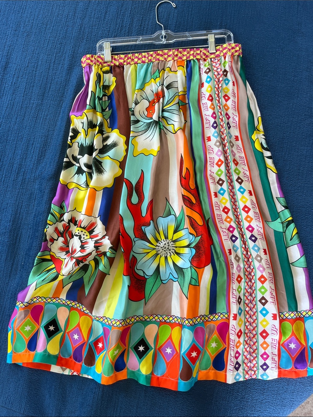 Me369 elastic waist inspirational print maxi skirt.  100% viscose. Size M/L NWOT